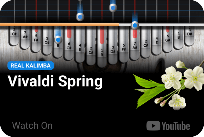 Real Kalimba Ode to Joy youtube video thumbnail with a white flower with green leaves on top of real kalimbas interface